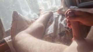 Boy sensually masturbate while enjoying the morning sun