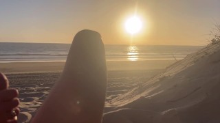 Public handjob. Hand job on a nude beach. We were caught jerking off at sunset near the ocean