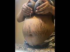 Ebony milf milking tits