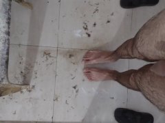 Dirty muddy bathroom my feets stepping there