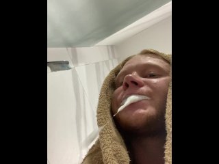 vertical video, solo male, brushing teeth, redhead