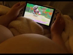 Caught playing games with my huge titties out