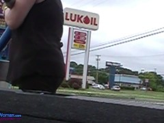 Braless Woman natural tits at the car wash vacuuming wearing a very sheer blouse no bra