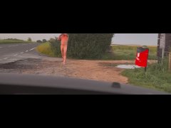 Barefoot nude at side of highway