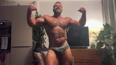 MUSCLE DADDY ROGAN PUMPS HIS MASSIVE GUNS