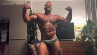 MUSCLE DADDY ROGAN PUMPS HIS MASSIVE GUNS