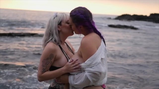 Hot lesbian sunset make out with titty play