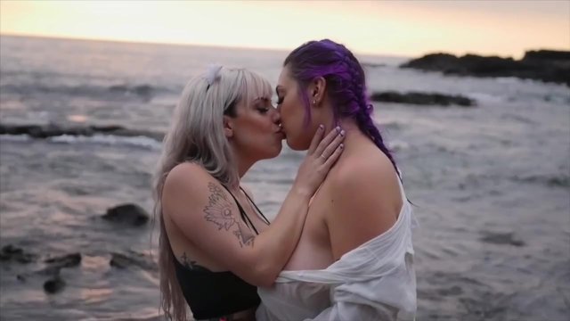 Hot lesbian sunset make out with titty play
