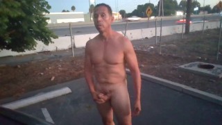 Naked guy public masturbation by the 55 FWY (with cumshot)