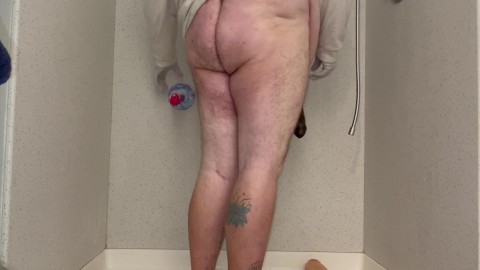 Fat hairy fem boy shoves 20 inch giant dildo up his ass in the shower