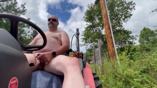Almost caught by neighbors as I masturbate on my tractor