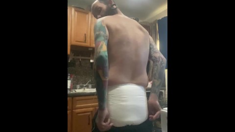 Diaper slave boy doing dishes for master with butt plug in