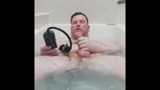 Pumping fat uncut cock in the tub and playing with my dick.