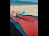 I show off my pussy and tits on the public beach