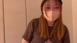 Japanese cosplayer gives a guy a handjob and with a vibrator on her clitoris.