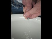 Preview 1 of Sounding rod with sprinkler head pissing with slow motion and foreskin