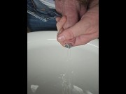 Preview 2 of Sounding rod with sprinkler head pissing with slow motion and foreskin