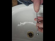 Preview 5 of Sounding rod with sprinkler head pissing with slow motion and foreskin