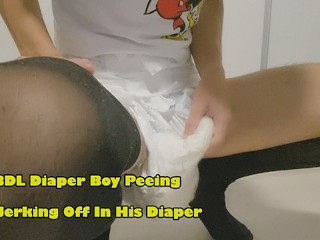 Diaper Boy Peeing and Jerking off in his Diaper