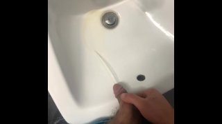 Piss in a sink