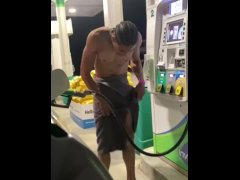 Pumping gas w my dick out. Almost got caught