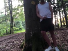 Jerking off behind a tree