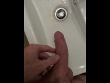 Washing the hotel sink with my pee