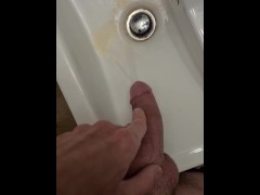 Washing the hotel sink with my pee