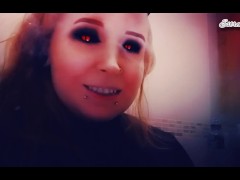 Demon plays with her tits and smokes a cigarette