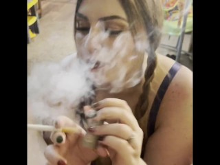 Sexy Smoker in Pigtails Eats Cum!