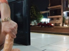 Limp sissy clitty dildoing her ass on the open door while cars pass by