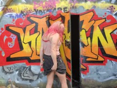 Hot white trash trans girl flashes the camera under an abandoned bridge