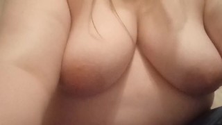 Playing with my breasts thinking of you
