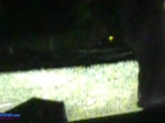 MILF wears a Fleece jacket outdoors at night topless braless while smoking roadside with traffic