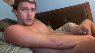 Hot gay Guy éjacule au lit