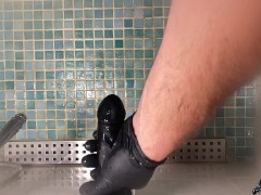 The man prepares for the strapon