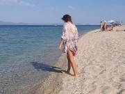 Preview 2 of Pissing shore stones among people on Public Beach