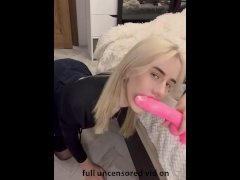 skinny blonde teen girl gives dildo a blowjob