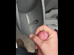 Taking a quick break from work for a piss and jerk