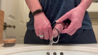 Pissing with a cock plug in. 4K