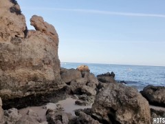 Hot guy masturbates on a public beach until his cock cums a lot