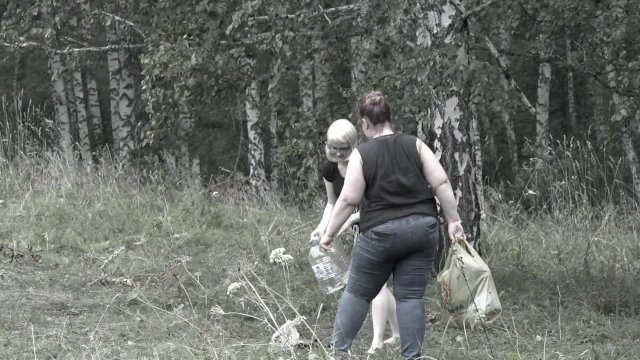 Mature girlfriends from Lesyanka are having fun in the forest.
