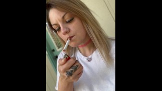 Hot babe dangling her morning cigarette