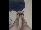 Hairy legs and fets about to get wet in piss