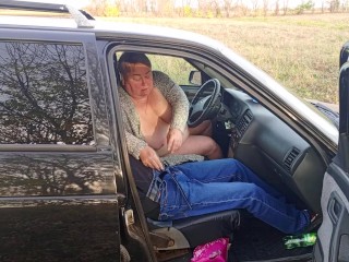 Jerking off a Dick in a Car in Nature