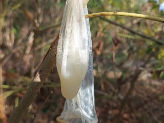 Young Horny Twink found a used Condom in the Woods, so he Put his Cock in it and Spermed