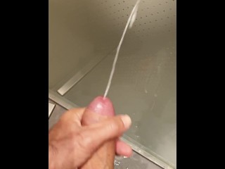 Cumming on a Glass Door