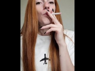 vertical video, smoking cigarette, red hair, solo female