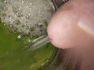 Pissing in a jar in EXTREME CLOSE-UP / EXTREME 240FPS SLOW MOTION