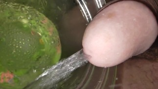 Pissing in a jar in EXTREME CLOSE-UP / EXTREME 240FPS SLOW MOTION